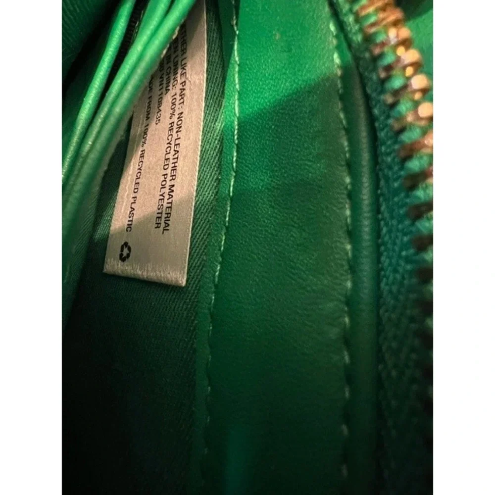 A New Day Green Zip Around Continental Wallet Wristlet‎ and a blue/teal pouch